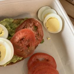 Reef Treats - Avocado toast is delicious!  Morning after a big storm, and the staff was happy and helpful! Comes with tomato slices and a hard boiled egg!