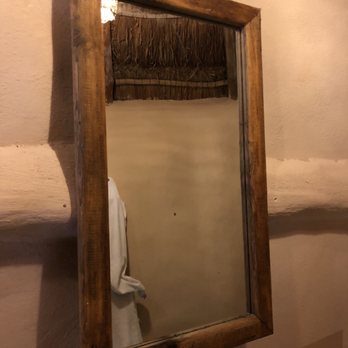 Papaya Playa Hotel - Ugly rickety mirror hanging by a screw - Restaurants Near Me - Tulum, ROO Papaya Playa Hotel - Ugly rickety mirror hanging by a screw - Restaurants Near Me - Tulum, ROO