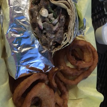 Wally's Cafe - 07. Beef Shawarma Wrap - meaty and tasty with side of amazing onion rings - Mediterranean Near Me - Rocklin, California Wally's Cafe - 07. Beef Shawarma Wrap - meaty and tasty with side of amazing onion rings - Mediterranean Near Me - Rocklin, California