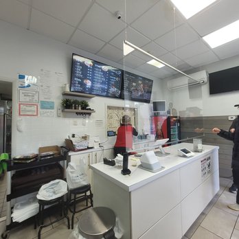 Bossam House - a man standing in a kitchen - Korean Near Me - Palisades Park, New Jersey Bossam House - a man standing in a kitchen - Korean Near Me - Palisades Park, New Jersey