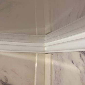 Bathliners Plus - the corner of a bathroom - General Contractors Near Me