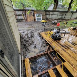 American Waterworks - Fargo - Nah, it's not too wet to do this job properly. Keep working.