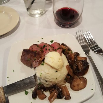 Fort Wayne Food Tours - At Don Hall's Old Gas House serving filet mignon with garlic-herb butter on mashed potatoes, sauteed mushrooms - Food Tours Near Me - Fort Wayne, Indiana