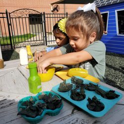 Little Fishers Preschool - Imaginative play during outdoor recess.