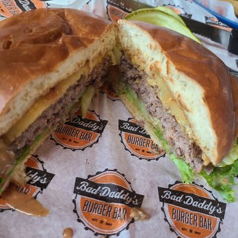 Bad Daddy's Burger Bar - Create your own burger with 7 oz patty, American and smoked gouda, lettuce and extra pickles. - Burgers Near Me - Decatur, Georgia Bad Daddy's Burger Bar - Create your own burger with 7 oz patty, American and smoked gouda, lettuce and extra pickles. - Burgers Near Me - Decatur, Georgia