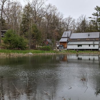 Oxbow Brewing Company - a view of a pond with a house in the background - Breweries Near Me - Newcastle, Maine Oxbow Brewing Company - a view of a pond with a house in the background - Breweries Near Me - Newcastle, Maine