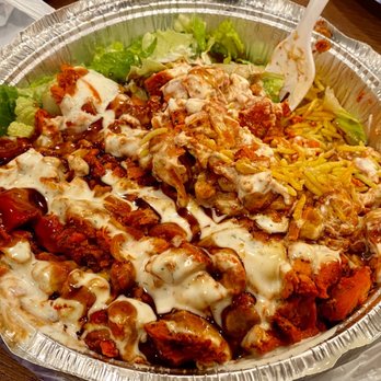 Halal-N-Out - ows a bowl of food on a table - Halal Near Me - New Hyde Park, New York Halal-N-Out - ows a bowl of food on a table - Halal Near Me - New Hyde Park, New York