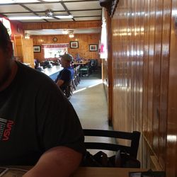 Lil Bit Restaurant - Two seating sections divided by an old fashioned diner counter.