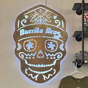 Burrito Bros - a neon sign with a skull on it - Mexican Near Me - Marion, North Carolina