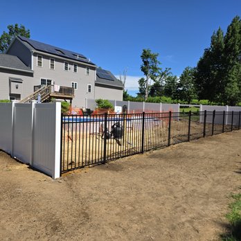 Brightstar Fence - 6' High privacy vinyl fence with 54" ornamental aluminum fence surrounding a pool. - Fences & Gates Near Me - Sturbridge, Massachusetts Brightstar Fence - 6' High privacy vinyl fence with 54" ornamental aluminum fence surrounding a pool. - Fences & Gates Near Me - Sturbridge, Massachusetts