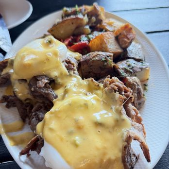 Station 330 - Prime Rib Benedict Get cheese sauce on the side. Tasted like velveta... better if it was smoked cheddar. - Mexican Near Me - Burleson, Texas
