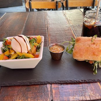 Tapas & Beers - Lunch combo with smoked salmon sandwich and a burrata and peach salad. - French Near Me - San Diego, California Tapas & Beers - Lunch combo with smoked salmon sandwich and a burrata and peach salad. - French Near Me - San Diego, California