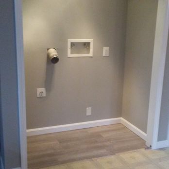 SRCS Carpentry - Unused Closet space turned into concealable laundry station - Handyman Near Me - Groton, Connecticut