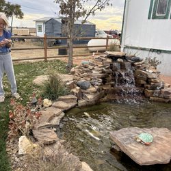 Hopkins Landscaping - Did the complete landscape job at our yard fencing pond and waterfall Sod irrigation system the whole 9 yards