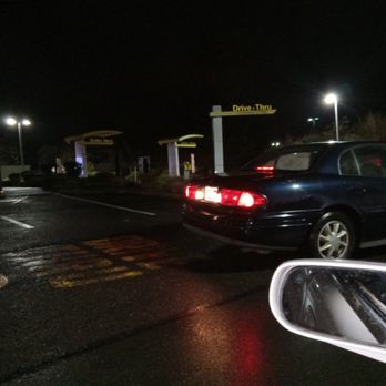 McDonald's - a car at a gas station at night - Burgers Near Me - Marysville, Washington
