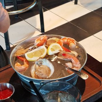 The General Public - Chilled shrimp and oysters on a half shell - New American Near Me - San Antonio, Texas