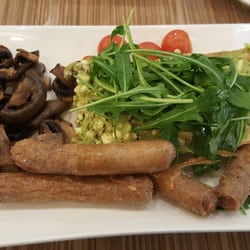 The Coffee Club - Avo and feta smash with cherry tomatoes and extra sides of chipolatas and mushrooms