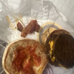 McDonald's - I got a double cheese burger with 2$ bacon this what I got they didn't even give me onions my last McDonald's meal right here