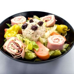 Genova’s To Go - A delightful bowl of Chef salad Genova's To Go, filled with mouthwatering meat, cheese, and vibrant veggies.