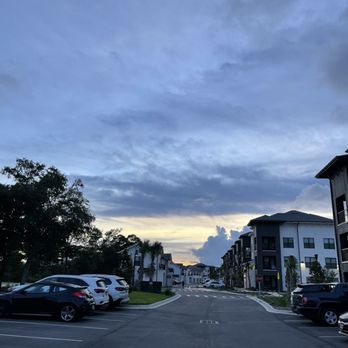 Olympus Emerald Coast - Parking lot (facing building 4). - Apartments Near Me - Destin, Florida