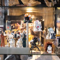 Assorted Table Wine & Shop - R2D2s. Lego Figures. Star Ships. Action Figures. 

Get your fix at Assorted Table Wine & Shop!
