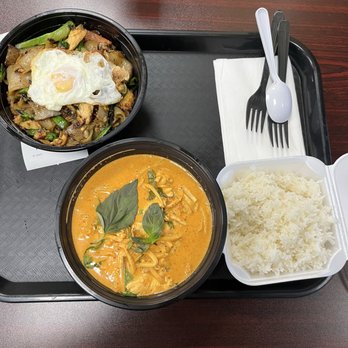Thai Golden Bowl - Red curry with jasmine rice and pad kee mao with chicken and fried egg - Thai Near Me - Columbus, Ohio Thai Golden Bowl - Red curry with jasmine rice and pad kee mao with chicken and fried egg - Thai Near Me - Columbus, Ohio