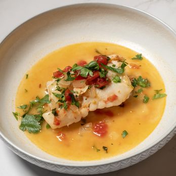 Hooked Market & Kitchen - Pesce all'Acqua Pazza (Fish in Crazy Water) - made at home with haddock from Hooked Market & Kitchen. Recipe by Cook's Illustrated. - Seafood Near Me - Latham, New York Hooked Market & Kitchen - Pesce all'Acqua Pazza (Fish in Crazy Water) - made at home with haddock from Hooked Market & Kitchen. Recipe by Cook's Illustrated. - Seafood Near Me - Latham, New York