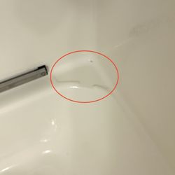 Country Inn & Suites by Radisson, Detroit Lakes, MN - What appears to be mold was under the shampoo bottle that was placed on a corner of the bathtub.