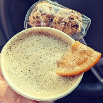 Haul'n Oats - a person holding a cup of coffee - Coffee & Tea Near Me - Muncie, Indiana