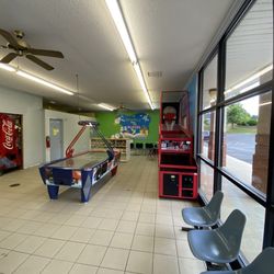 Family Coin Laundry - Games and tanning beds , vending machines