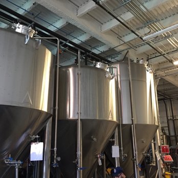 Grimm Artisanal Ales - Some background brewing. One of the only parts that actually looks like a brewery. - Breweries Near Me - Brooklyn, New York