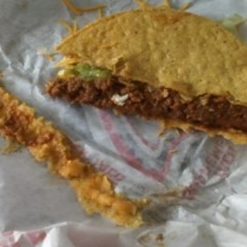 Taco Bell - How one of the tacos appeared when I opened it. The other side of the shell is also broke. - Fast Food Near Me - Southfield, Michigan