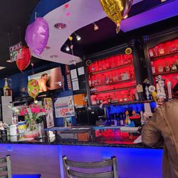 Tipicos Los Reyes - Bar scene with TV