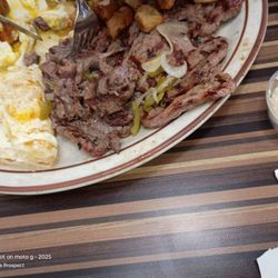 Tom's Famous Family Restaurant - Steak and egg and home fries comes with 2 slices of toast