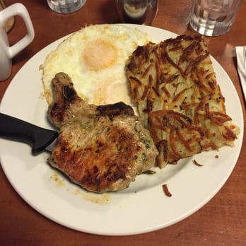 Matt's Big Breakfast - Pesto marinated pork chop and chick. ¡Riquísimo! Over easy egg and hash browns on side with a splash of tapatio made it perfect. - Breakfast & Brunch Near Me - Phoenix, Arizona