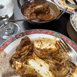 Lakshmi Bhavan - On plate chicken vindaloo.  In background small pot of chicken Tika masala.