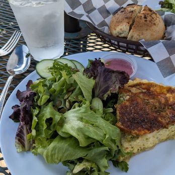 The Optimist Cafe - Vegetable quiche and salad with a fig bagel also made here. - Bakeries Near Me - Jaffrey, New Hampshire