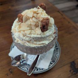 Pazzo Pomodoro - Banana Foster - Banana flambe with pecans and almonds, served with cinnamon gelato and vanilla cream