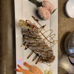 Umai Bento - Kani (crab) sushi - left Spider Roll - center Ebi (shrimp) sushi - right