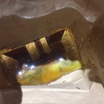 Wingstop - Wingstop is an absolute disgrace! So much grease on our wings just look at the bottom of the bag!  Never again! - Chicken Wings Near Me - Midland, Texas