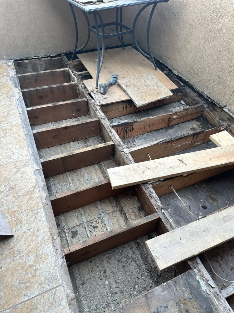 Slide of T’S Roofing