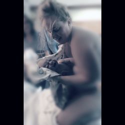 Alyssa Grace Doula Services - Sweet mama catching her baby boy