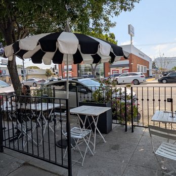 Romancing the Bean Cafe - Exterior umbrella seating - Coffee & Tea Near Me - Burbank, California Romancing the Bean Cafe - Exterior umbrella seating - Coffee & Tea Near Me - Burbank, California