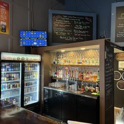 Inside for full bar and food menu. fresh artisan pizza made from scratch