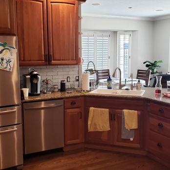 A Handy Service - a kitchen with stainless steel appliances - Handyman Near Me A Handy Service - a kitchen with stainless steel appliances - Handyman Near Me