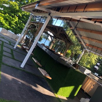 Vineyard Inn On Suttons Bay - Bar with great music and swings! - Italian Near Me - Suttons Bay, Michigan