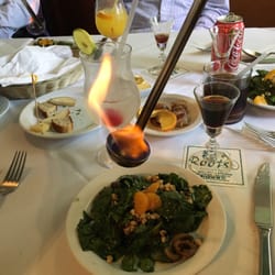 Roots Restaurant Bar - Spinach salad, served with orange liquor.