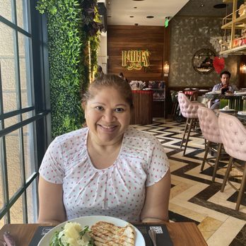 Baires Grill - Doral - Wifey with decor.   Dish: chicken palliard - Steakhouses Near Me - Doral, Florida