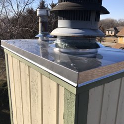 A Clean Sweep Chimney - Brand new stainless chase top replaces the old leaky rusted one