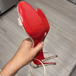 Houston Shoe Hospital - Louboutin heels with protective cover on bottom (worn a couple times before this picture was taken)